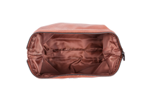 Load image into Gallery viewer, The Gilbert Men’s Toiletry Case is the perfect men’s travel accessory. Designed to fit his toiletries with ease and constructed with quality vegan leather, it is an ideal gift for the men in your life. 2 Colours to choose from: Black Tan Pair it with the Sinatra Toiletry Case for a set that has him covered! Internal features: 1 Zip Pocket Lining: Nylon Closure: Secure Zip Material: Vegan Leather Hardware: Gun Metal Dimensions: W25.5 x H16.5 x D9cm. Shown: Inside of bag