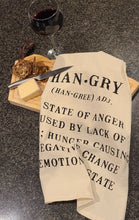 Load image into Gallery viewer, This Flour Sack style, 100% cotton tea towel has a screen-printed design, is washable and reusable. Machine wash gentle cycle. Measures: 20" w x 28" Quote on towel: "Hangry...A State of Anger Caused by Lack of Food; Hunger Causing A Negative Change in Emotional State"