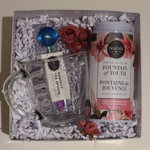 Load image into Gallery viewer, Enjoy the contemporary style, and seeing what's inside, when you sip from this square clear glass mug.  Serve up hot toddies, cappuccinos, lattes, tea, hot cocoa, and more. Constructed from high-quality glass for everyday durability.  Pair it with our beautiful teas and accessories for the ultimate tea set gift-box.  Size:  4" L  Material:  Clear Glass  Capacity:  14oz