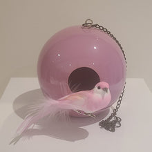 Load image into Gallery viewer, The beautiful pink ceramic ball birdhouse is inspired by the natural form of birds nests. It's a whymsical, fun and stylish look for any indoor/outdoor decor. It comes as a suspended birdhouse, which you can hang from a branch or wallhook. Dimensions: 5" x 5" Material: Ceramic