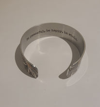 Load image into Gallery viewer, We have picked some of our favourite pieces and paired them with an inspirational saying that resonates with us.  Quote inside:  "Be peaceful, be happy, be whole."  Made of aluminum each cuff is hypo-allergenic, lead and nickel free, with no toxic finishes. Everything is printed with a permanent dye which gives a nice vibrant finish.   Cuffs are super light weight and adjustable allowing them to be molded to fit most sizes.   Each cuff is 3/4" thick