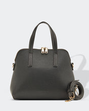 Load image into Gallery viewer, This Black Candice Handbag is a classic style.  Beautiful and easy to carry and sits perfectly when placed down.  A stunning design makes this perfectly sized handbag a must have!  Features:  1 x Phone Pocket 1 Zip Pocket 1 Flat Pocket Internal lining: Black/White Stripe Lining Strap Height: 13cm Extension strap: 110cm Adjustable Detachable Closure: Secure Zip Material: Vegan Leather  Hardware: Light Gold  Dimensions: W28 x H24.5 x D11cm