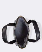 Load image into Gallery viewer, This Black Candice Handbag is a classic style.  Beautiful and easy to carry and sits perfectly when placed down.  A stunning design makes this perfectly sized handbag a must have!  Features:  1 x Phone Pocket 1 Zip Pocket 1 Flat Pocket Internal lining: Black/White Stripe Lining Strap Height: 13cm Extension strap: 110cm Adjustable Detachable Closure: Secure Zip Material: Vegan Leather  Hardware: Light Gold  Dimensions: W28 x H24.5 x D11cm