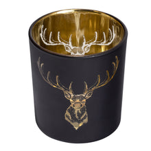 Load image into Gallery viewer, This beautiful Silhouette Glass Votive brings the timeless elegance of black and gold together with the iconic silhouette of the noble staghead. This piece is the perfect accent to any home, office, or cottage and makes a great addition to your holiday decorations. Add ambience to your room with a tealight, or place on a shelf or table and fill with a pre-potted plant or florals for a lively display. Size: 3" H x 3"D Handwash *Includes (1) tealight