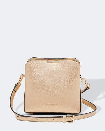 The Soho small crossbody is a huge hit! Perfect styling for an evening out.  Can we just say this beautiful colour will complement any of your outfits.    Features:  1 Internal Flat Pocket 2 External Flat Pockets Internal lining Extension strap: 130cm Adjustable Detachable Closure: Secure Zip Material: Vegan Leather  Hardware: Light Gold  Dimensions:  W18 x H17 x D10 cm
