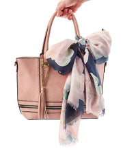 Load image into Gallery viewer, Nothing says spring like this lightweight scarf, styled with a beautiful Lotus print and features the sentiment in gold, "I AM MAKING A DIFFERENCE IN THE WORLD EVERY DAY."   So pretty and versatile.  Makes a great Birthday, Mother's Day or Just Because gift.  Size:  71.5" x 28"  Material:  Polyester.  **Hand wash only.  Shown made into a bow on a purse handle