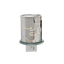 Load image into Gallery viewer, Aluminum crafted, this electric plug-in night light, with on/off switch, is ideal for any room in the house, especially bedrooms and corridors.  It will be an extension of your decor and the beautiful silhouette face pattern will provide a warm and soft glow.  Size:  2.5 x2.5 x2.9 in. 1 Watt LED, warm white light bulb included In-door use only