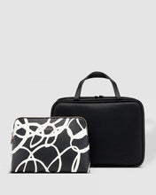 Load image into Gallery viewer, The Emma hanging toiletry case is the perfect travel companion with waterproof sealed compartments and a hook for convenient hanging. In this bundle it is paired with the Bardot Toiletry case. A complete cosmetics solution! Each Also Sold Separately! Material: Vegan Leather Hardware: Rose Gold Dimensions: H18.5 x W26 x D9 cm & Material: Vegan Leather Hardware: Silver Dimensions: H21 x W28 x D9 cm