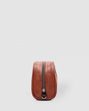 Load image into Gallery viewer, The Sinatra Men’s Toiletry Case is a great men’s travel accessory. Designed to fit just the essentials, his toiletries will be organized, and compact with this travel cases’ four elasticated slip pockets and mesh zip pocket.2 Colours to choose from: Black Tan Pair it with the Gilbert Toiletry Case for a set that has him covered! Features: 4 Elastic Slip Pockets 1 Mesh Zip Pocket Lining: Nylon Closure: Secure Zip Material: Vegan Leather Hardware: Gun Metal W22 x H14 x D5cm. Shown: Tan