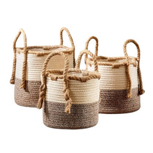 Load image into Gallery viewer, Add these beautiful storage baskets to your living space.  These two-tone cotton rope baskets are designed in natural shades of beige and brown. Jute rope handles at the sides make it easy to move the baskets around any room.   3 sizes to choose from:  Small:  8" Diameter Medium:  9.5" Diameter Large:  10.5" Diameter Get creative and use them as the base for an amazing gift basket filled with our great products.  Material:  Cotton, Jute.