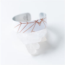 Load image into Gallery viewer, Quote inside:  "Well behaved women seldom make history."  Made of aluminum each cuff is hypo-allergenic, lead and nickel free, with no toxic finishes. Everything is printed with a permanent dye which gives a nice vibrant finish.   Cuffs are super light weight and adjustable allowing them to be molded to fit most sizes.   Each cuff is 3/4" thick and are perfect for stacking.