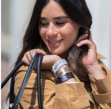 Load image into Gallery viewer, We have picked some of our favourite pieces and paired them with an inspirational saying that resonates with us. Quote inside: "Life is a story. Write well. Edit often." Made of aluminum each cuff is hypo-allergenic, lead and nickel free, with no toxic finishes. Everything is printed with a permanent dye which gives a nice vibrant finish. Cuffs are super light weight and adjustable allowing them to be molded to fit most sizes. Each cuff is 3/4" thick