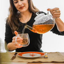 Load image into Gallery viewer, A large glass teapot that blends beautiful design with quality materials such as borosilicate glass & stainless steel. Extra large 2 liter / 68 fl. oz capacity makes this the perfect teapot for when you have company or need more than a couple of cups of tea.  With a stainless steel ultra fine unbreakable infuser.