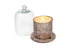 Load image into Gallery viewer, Made from a lovely clear glass with a rounded knob, this cloche allows the beauty of the candle's design to been seen while preserving its scent, and protecting the candle from dust or damage, helping them last longer. Features a beautiful Amber Spruce scent of wintergreen, and eucalyptus leaves. LENGTH: 3.25 WIDTH: 3.25 HEIGHT: 4.50 Shown: Lit Rose Gold Cloche