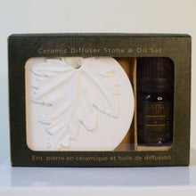Load image into Gallery viewer, These Ceramic Diffuser & Essential Oil Gift Sets provide a portable touch of beauty; wherever, whenever. The ceramic diffuser porous stone features an elegant nature inspired design and quickly absorbs, retains and gently emits a concentrated blend of diffusing oil. Gift Boxed.  3 Scents to choose from:  Lavender Fields Sandalwood Jasmine Lyrical Angelica Perfect to hang in your car, closets, powder rooms or any small spaces around your home.  Shown:  Sandalwood Jasmine