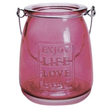Load image into Gallery viewer, This Pink Glass Jar Tealight Candle Holder is a stylish home decor for lovers of pink and  glamorous interiors. These will also make an excellent outdoor decor. It makes an excellent accessory and gift idea for Valentine's Day, or any occasion, with it's "Enjoy Life, Love, Living" inscription.  Perfect for holding a little tealight or use for storing makeup, office or art supplies like brushes and markers.  Use freestanding or hang anywhere from the metal handle. Size:  3.5" H x 3.5"D *Includes (1) tealight