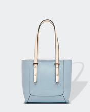 Load image into Gallery viewer, Small, sweet and on-trend!  This gorgeous Pale Blue Hazel Handbag screams Audrey Hepburn!!  Such a classic style and easy to carry, this perfectly sized handbag has more than enough room for all your essentials.  Features:  1 x Phone Pocket 1 Flat Pocket Feet on base Internal lining Strap Height: 20cm Extension strap: 110cm Adjustable Detachable Closure: Secure Zip Material: Vegan Leather  Hardware: Light Gold  Dimensions: W22 x H21 x D8 cm