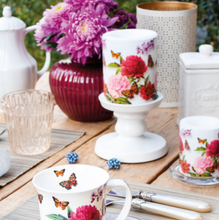 Load image into Gallery viewer, Spring Beauty!!  This peonien candle will add a gorgeous touch to any table or decor.  A good celebration is as much about the ambience as it is about food. Serve up your next dinner party with these beautiful tabletop accent candles and celebrate in style!  These parafin wax candles have a beautiful glow design when lit. Burning time: 35 hours Dimensions: 3.5 x 3 in Material:  parafin wax Unscented