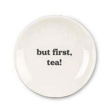 Load image into Gallery viewer, Get your priorities in order with the help of this “But First, Tea” Small Plate. Crafted out of stoneware with a glossy ivory finish, this plate is the perfect size for tea bags or your favourite tea-time treats.   Pair it with any of our tea sets for a perfect gift.  Size:  3.5" D  Material:  Stoneware  Colour:  Ivory