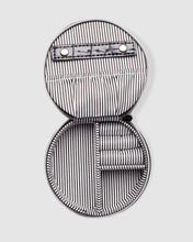 Load image into Gallery viewer, Organize your essential items easily with three ring rolls, two compartments, an elasticated slip pocket and a press stud tab for earrings. Structured and protected, this beautiful jewellery case will be your new travel companion. Features: 3 Ring Rolls 2 Compartments, 1 Elastic Slip Pocket 1 Press Stud Earring Band Lining: Black/White Stripe Closure: Secure Zip Material: Vegan Leather Hardware: Light Gold Dimensions: W9.6 x H4.3 x D9.6cm. Shown: Black