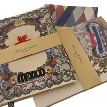 Load image into Gallery viewer, Made for notes-on-the-go. Beautifully detailed artwork by artist Christian Lacroix both outside and inside the jourrnals.  These gilded gold edged journals are great for recipes, to-do lists, work details, or just doodles and daily thoughts, complete with striped ribbon marker for 128 lined pages.  Perfect as a gift for yourself or someone who loves to put their thoughts to paper.    3 Styles to choose from:  Mexico Rio De Janeiro Mascerade Dimensions:  8" H x 6" W