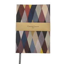 Load image into Gallery viewer, Made for notes-on-the-go. Beautifully detailed artwork by artist Christian Lacroix both outside and inside the jourrnals.  These gilded gold edged journals are great for recipes, to-do lists, work details, or just doodles and daily thoughts, complete with striped ribbon marker for 128 lined pages.  Perfect as a gift for yourself or someone who loves to put their thoughts to paper.    3 Styles to choose from:  Mexico Rio De Janeiro Mascerade Dimensions:  8" H x 6" W