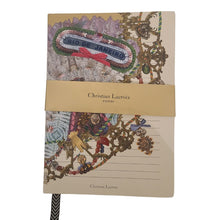 Load image into Gallery viewer, Made for notes-on-the-go. Beautifully detailed artwork by artist Christian Lacroix both outside and inside the jourrnals.  These gilded gold edged journals are great for recipes, to-do lists, work details, or just doodles and daily thoughts, complete with striped ribbon marker for 128 lined pages.  Perfect as a gift for yourself or someone who loves to put their thoughts to paper.    3 Styles to choose from. Mascerade Dimensions:  8" H x 6" W