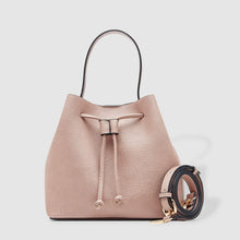 Load image into Gallery viewer, Complete with a drawstring closure, the Sasha is perfect for your next brunch with the girls, or a day out on the town.  Wear it your way and sling over your shoulder for a more casual look or carry by her top handle for a dressier option.  Features:  1 Slip Pocket Internal lining - Vegan Leather Extension strap: 114-128cm Adjustable Detachable Closure: Magnetic Clasp with Draw String Material: Vegan Leather  Hardware: Light Gold  Dimensions: W26 x H23 x D14 cm