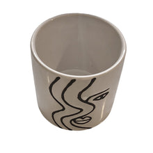 Load image into Gallery viewer, So simple, yet stricking!  This beautiful ceramic planter captures the Face Silhouette so elegantly with its hand-painted design.  It is so versatile it can be used for gorgeous plants, or get creative and use it as a home decor piece on your coffee table or bookshelf.  You can also put it in your office or kitchen for pens, spoons, etc.  Makes a great gift too!  Size:  4" x 4"  Material:  Ceramic