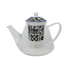 Load image into Gallery viewer, This is a classic glass teapot with the added beautiful detail of a blue mosaic porcelain infuser and lid.  Gorgeous for any breakfast or brunch table, this teapot will make the perfect cup of loose leaf tea.  Pair it with our beautiful collection of cups and teas for an ultimate Birthday, Mother&#39;s Day, Hostess or Just Because gift.  Size:  23oz capacity  Material:  Glass/Ceramic
