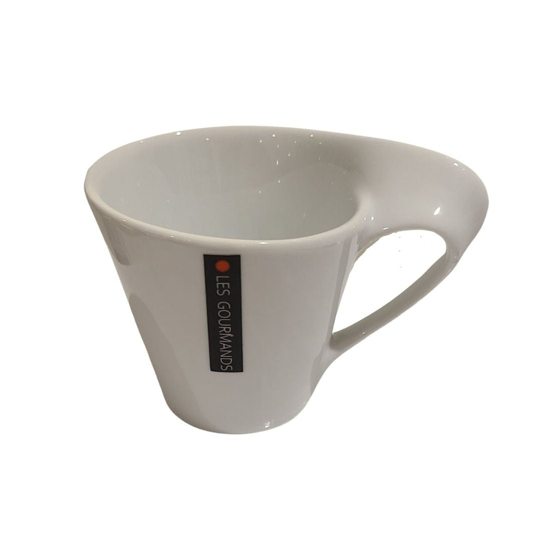 Bold and stylish, these Les Gourmands coffee mugs are the perfect addition to any kitchen. A very chic, contemporary collection styled in geometric shapes. 2 colours available Size: 200ml Material: Ceramic Shown: White mug