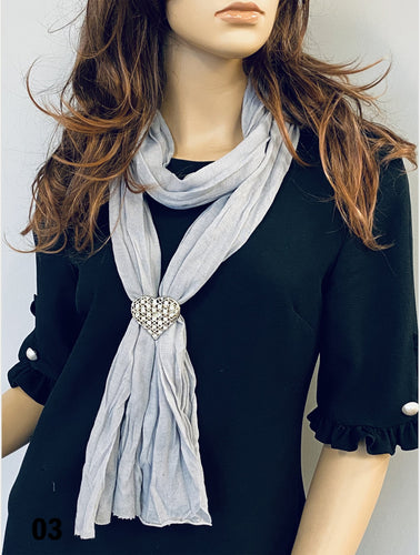 Scarves are an important accessory and a definite must have in any wardrobe.  Our beautiful Jersey scarf with rhinestone charm pendant is perfect for any day of the year and will add sparkle to that wardrobe for any time of the day.