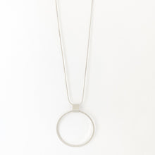 Load image into Gallery viewer, Sometimes simplicity is best.  This simple yet elegant brushed metal ring pendant necklace will definitely be your &quot;go to&quot; accessory.  Easily adjustable for any outfit.  2 Colours to choose from:  Brushed Gold Brushed Silver *Adjustable
