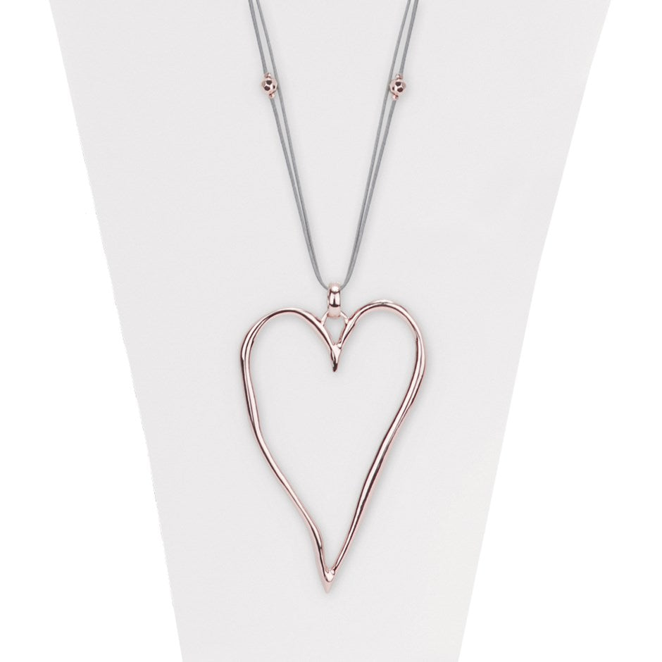 We are so in love with this beautiful big and shiny rose gold large heart pendant necklace. With its beaded adjustable cord, it's definitely an eye-catcher.  So versatile, it can be worn with any outfit for any occassion.  *Adjustable