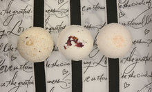 Load image into Gallery viewer, These Bath Bombs are just as beautiful as they are soothing - packed with healing essential oils that will help you relax your mind and body and enjoy their properties.  3 Scents to choose from:  Rose Petal. Himalayan Salt. Vanilla Oatmeal. Highlights: All-Natural Ingredients Handmade 100 % Pure Essential Oils
