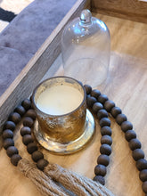 Load image into Gallery viewer, A simple must have coffee table styling piece, these wooden beads add a touch of feel-good style to your living space. Inspired by Mala beads used for prayer and meditation, they encourage mindfulness, peace, and clarity. Dimensions: 48&quot;L x 0.5&quot;W x 0.5&quot;H Materials: Paulownia Wood, Jute rope tassels - Carved from paulownia wood and finished with a brown wash
