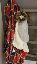 Load image into Gallery viewer, This cozy reversible throw is perfect for your seasonal decor.  Traditional plaid design on one side and soft and fuzzy sherpa on the other, adorned with cute tassels to make this a festive home decor.  Perfect for a chilly Christmas morning unwrapping gifts by the fireplace.  Pair it with our Sherpa socks and a candle for the ultimate seasonal gift.  Size:  60 × 50 in  Acrylic/Polyester
