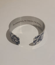 Load image into Gallery viewer, We have picked some of our favourite pieces and paired them with an inspirational saying that resonates with us. We know you will love this piece as much as we do.   Quote inside:  &quot;Be peaceful, be happy, be whole.&quot;  Made of aluminum each cuff is hypo-allergenic, lead and nickel free, with no toxic finishes. Everything is printed with a permanent dye which gives a nice vibrant finish.   Cuffs are super light weight and adjustable allowing them to be molded to fit most sizes.   Each cuff is 3/4&quot; thic
