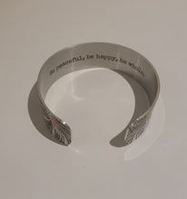 Load image into Gallery viewer, We have picked some of our favourite pieces and paired them with an inspirational saying that resonates with us.  Quote inside:  &quot;Be peaceful, be happy, be whole.&quot;  Made of aluminum each cuff is hypo-allergenic, lead and nickel free, with no toxic finishes. Everything is printed with a permanent dye which gives a nice vibrant finish.   Cuffs are super light weight and adjustable allowing them to be molded to fit most sizes.   Each cuff is 3/4&quot; thick
