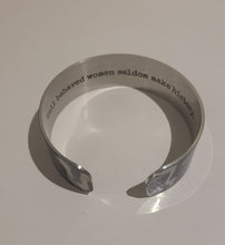 Load image into Gallery viewer, We have picked some of our favourite pieces and paired them with an inspirational saying that resonates with us. We know you will love this piece as much as we do.   Quote inside:  &quot;Well behaved women seldom make history.&quot;  Made of aluminum each cuff is hypo-allergenic, lead and nickel free, with no toxic finishes. Everything is printed with a permanent dye which gives a nice vibrant finish.   Cuffs are super light weight and adjustable allowing them to be molded to fit most sizes.   Each cuff is 3/4&quot; thick
