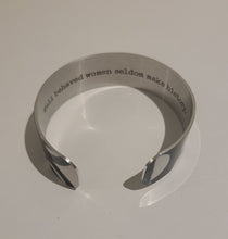 Load image into Gallery viewer, We have picked some of our favourite pieces and paired them with an inspirational saying that resonates with us. We know you will love this piece as much as we do.   Quote inside:  &quot;Well behaved women seldom make history.&quot;  Made of aluminum each cuff is hypo-allergenic, lead and nickel free, with no toxic finishes. Everything is printed with a permanent dye which gives a nice vibrant finish.   Cuffs are super light weight and adjustable allowing them to be molded to fit most sizes.   Each cuff is 3/4&quot; thick
