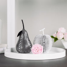 Load image into Gallery viewer, This charming resin white apple figure features a painted debossed textured dot pattern to highlight its modern form, giving it a twist to traditional apple decorations.  This whimsical decorative accent makes a fun, yet bold statement when perched on a shelf or table in the kitchen or living room. Display it on its own or pair it with its complementary black resin pear for a unique look as shown.  Perfect for Birthdays, Housewarming, Bridal Shower or Teachers gift.  Size:  5d x 6.25h&quot;  Material:  Polyresin
