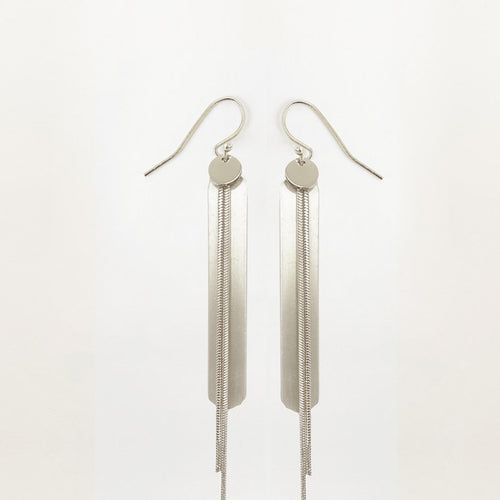 Make a statement with these long and delicate earrings.  Fun and sexy for a night out.  Details:  Silver brushed metal 3