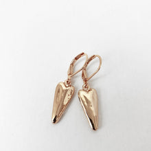 Load image into Gallery viewer, Simple, delicate and adorable.  These small heart earrings can be worn for any occassion.  A definite &quot;must have&quot; accessory.  Details:  Rose gold hammared metallic 1&quot; long Hypoallergenic Nickel/lead free 3 coats anti-tarnish
