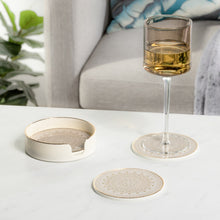 Load image into Gallery viewer, The gorgeous Art Deco inspired White and Gold pattern of these Savoy glass top coasters make them truly stand out. The plastic trim and glass top makes them easy to care for. Includes the storage box. Size:  Each. 4d x 0.25h&quot; (Set of 4) Box. 4.25d x 1.25h&quot;  Material:  Glass/Plastic Colour:  White/Gold 
