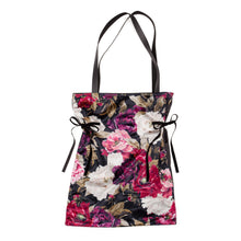 Load image into Gallery viewer, Arrive in style with this satin-lined bohemian black and floral velour tote bag. Perfect for carrying your shoes, groceries, laptop, etc.  Super soft and features two ties on the sides to cinch it when necessary.  Make your next gift extra special by swapping the traditional gift bag for this luxurious tote instead!  Measures: 18&quot;L x 14&quot;W, 22&quot; L handle  Materials: Polyester Machine wash in cold water, gentle cycle.  Lay flat to dry.
