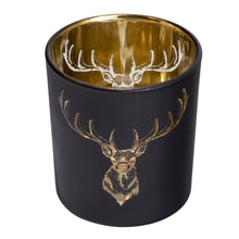 Load image into Gallery viewer, This beautiful Silhouette Glass Votive brings the timeless elegance of black and gold together with the iconic silhouette of the noble staghead. This piece is the perfect accent to any home, office, or cottage and makes a great addition to your holiday decorations.  Add ambience to your room with a tealight, or place on a shelf or table and fill with a pre-potted plant or florals for a lively display.  Size:  3&quot; H x 3&quot;D  Handwash  *Includes (1) tealight

