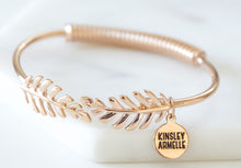 Load image into Gallery viewer, The Laurel Leaf Goddess Metal Cuff Bracelet in Rose Gold derives its roots from royalty - be sure this will impress those around you!  This elegant piece demands attention when being worn on its own or as part of the Lainey Stack , Exclusively from Kinsley Armelle.  Details:  Style: Cuff Material: 18K Rose Gold Ion Plated Stainless Steel Size: 6.5 - 8 Inch Circumference
