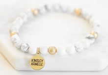 Load image into Gallery viewer, The Pepper Keystone Beaded Bracelet is an absolute no-brainer when creating the perfect stack. It is featured as part of the Lennox Stack. The stone color on this bracelet is sure to grab attention, but subtle enough to wear with any outfit! Exclusively from Kinsley Armelle.  Details:  Style: Beaded Material: White Howlite and Metal Size: 6.5 - 8 Inch Circumference
