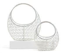 Load image into Gallery viewer, Add to the festive look of your home with this white wire basket set.  Styled with a comfort grip handles and oval design.  Use them to decorate for the season.  They will look lovely on your Easter table filled with colourful eggs or flowers. Perfect for using to gather all the treats from your egg hunt too!  Set Includes:  (1) Small - 6.5&quot; x 7.5&quot; (1) Large - 9.5&quot; x 10&quot; Material:  Metal
